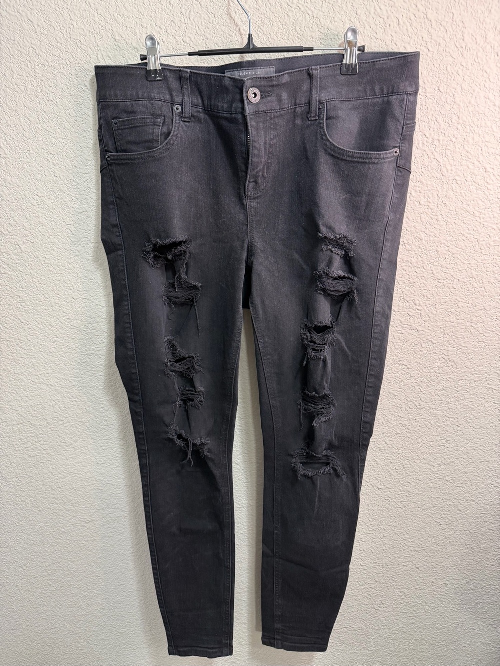 torrid Black Distressed Jeggings with Ripped Knees